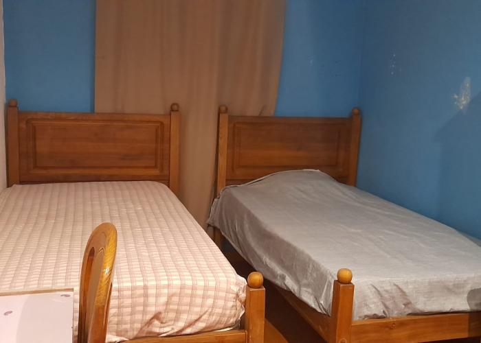 Quarto individual com duas camas Quarto individual com duas camas