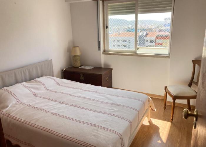 Quarto com cama de casal