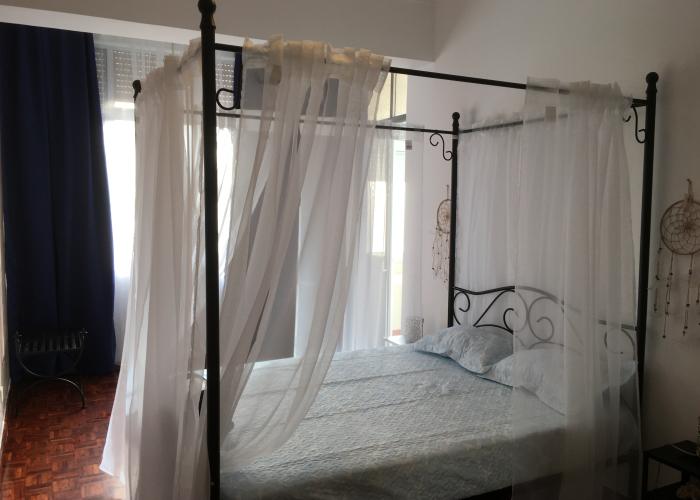 Quarto com Varanda