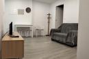 Sala de estar e refeição com TV