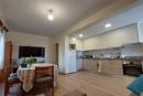 espaço comum sala e cozinha