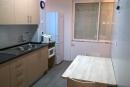 Cozinha (tem televisão por cima da mesa)