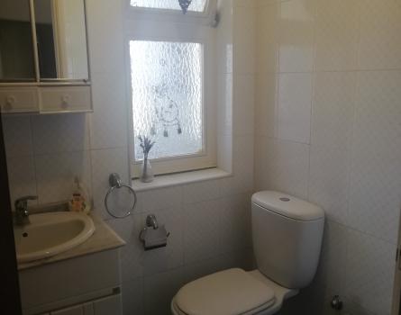 Casa de banho privada com chuveiro