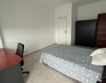 Quarto 19m2 com cama casal e acesso a varanda